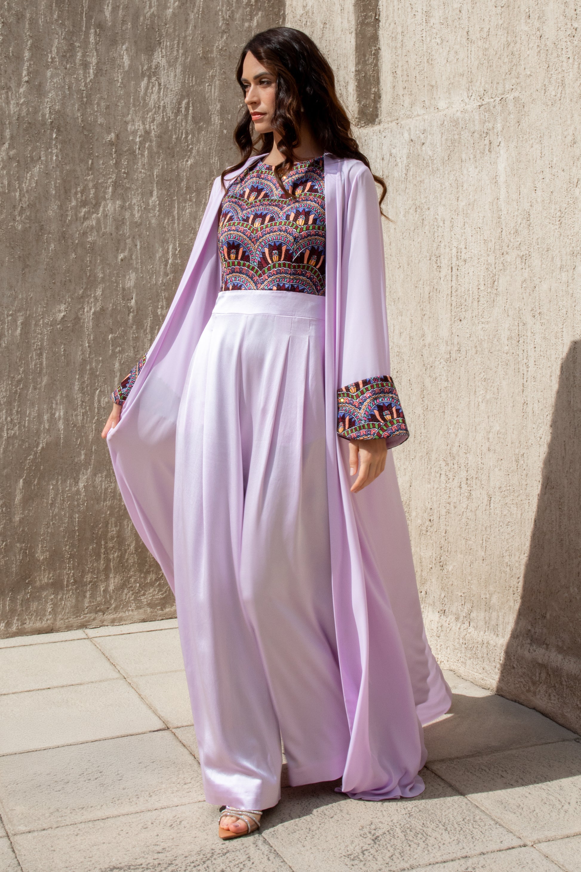 Side view of lilac Amethyst Haze jumpsuit with flowing overlay