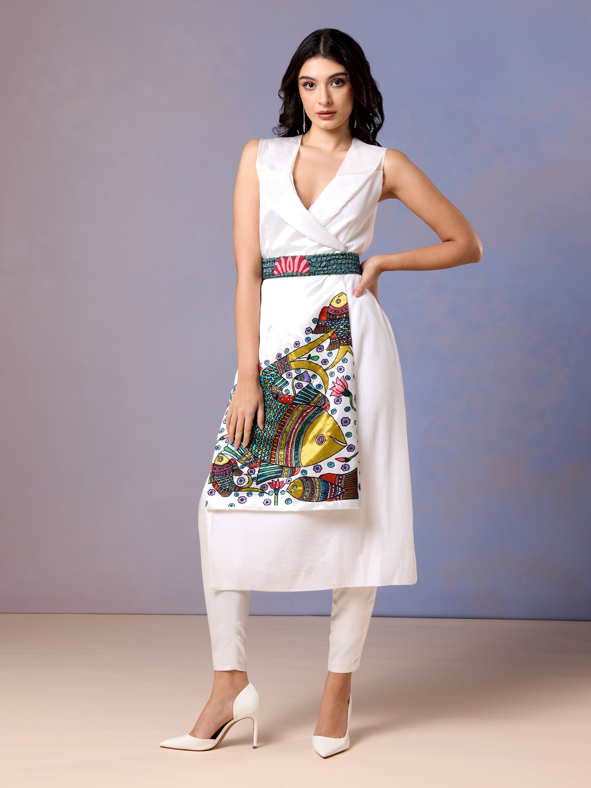 Women wearing Chantilly white kurti set with colorful hand-embroidered