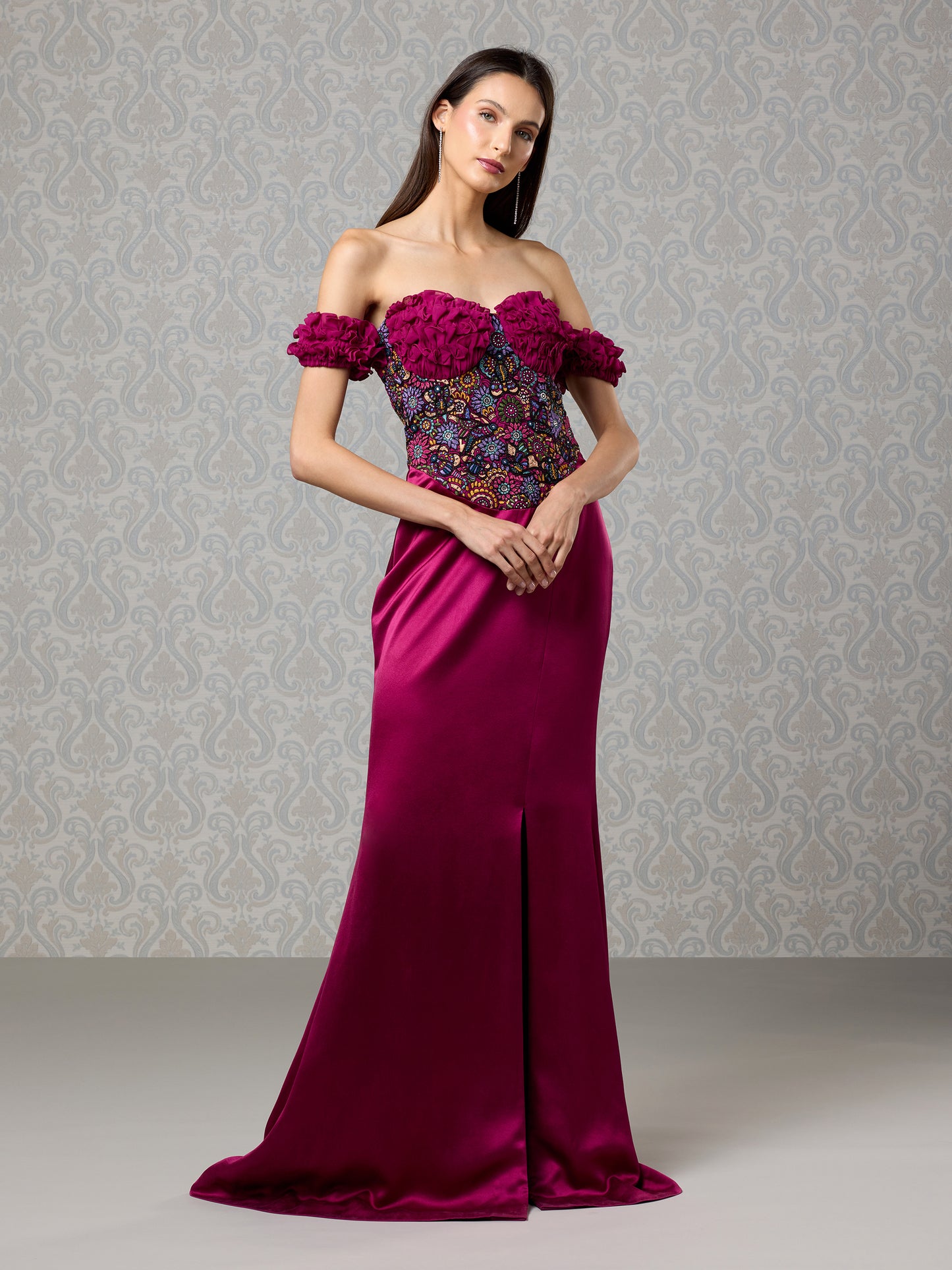 Front view of cranberry silk satin georgette gown with floral off-shoulder design