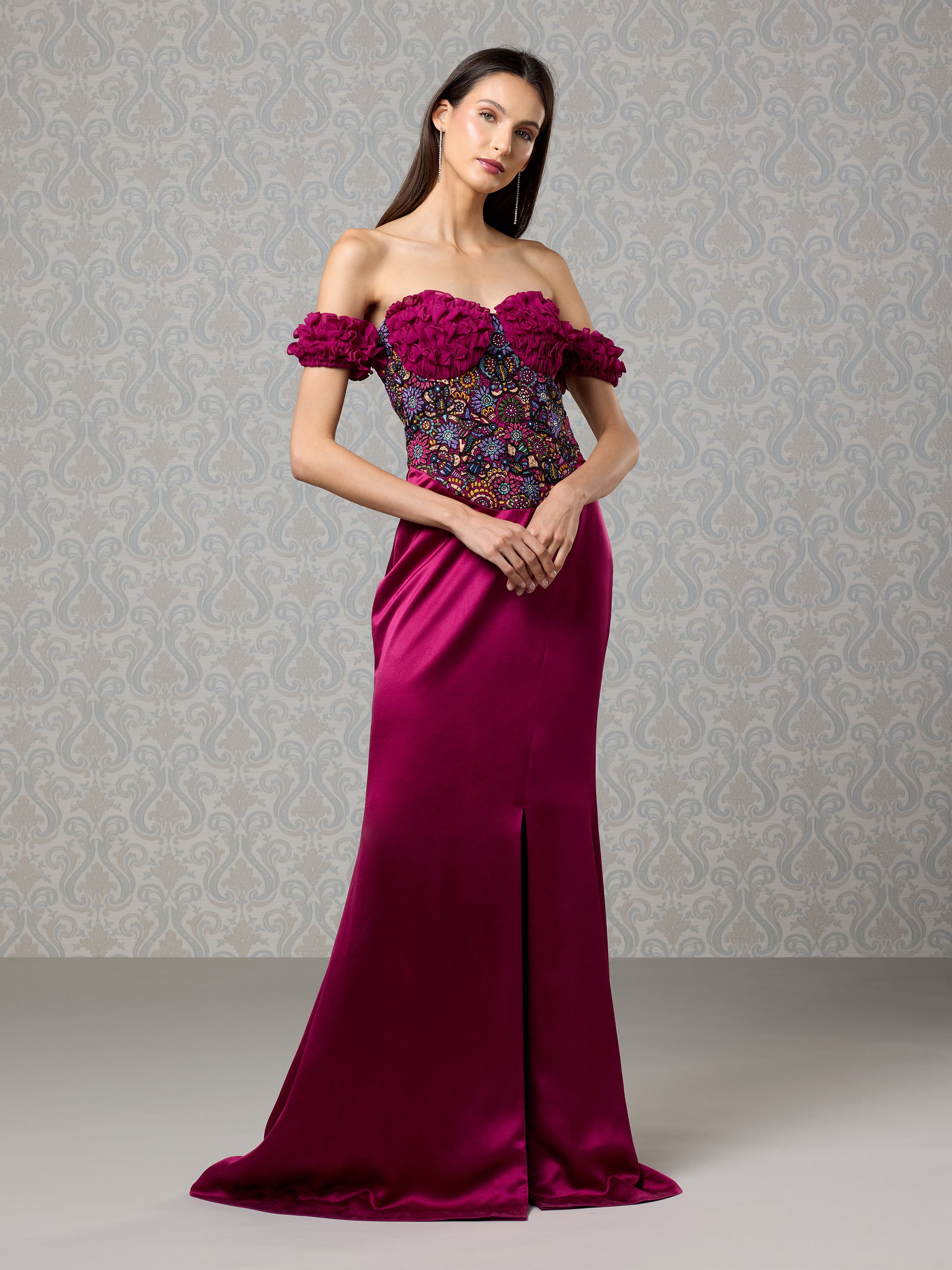 Front view of cranberry silk satin georgette gown with floral off-shoulder design