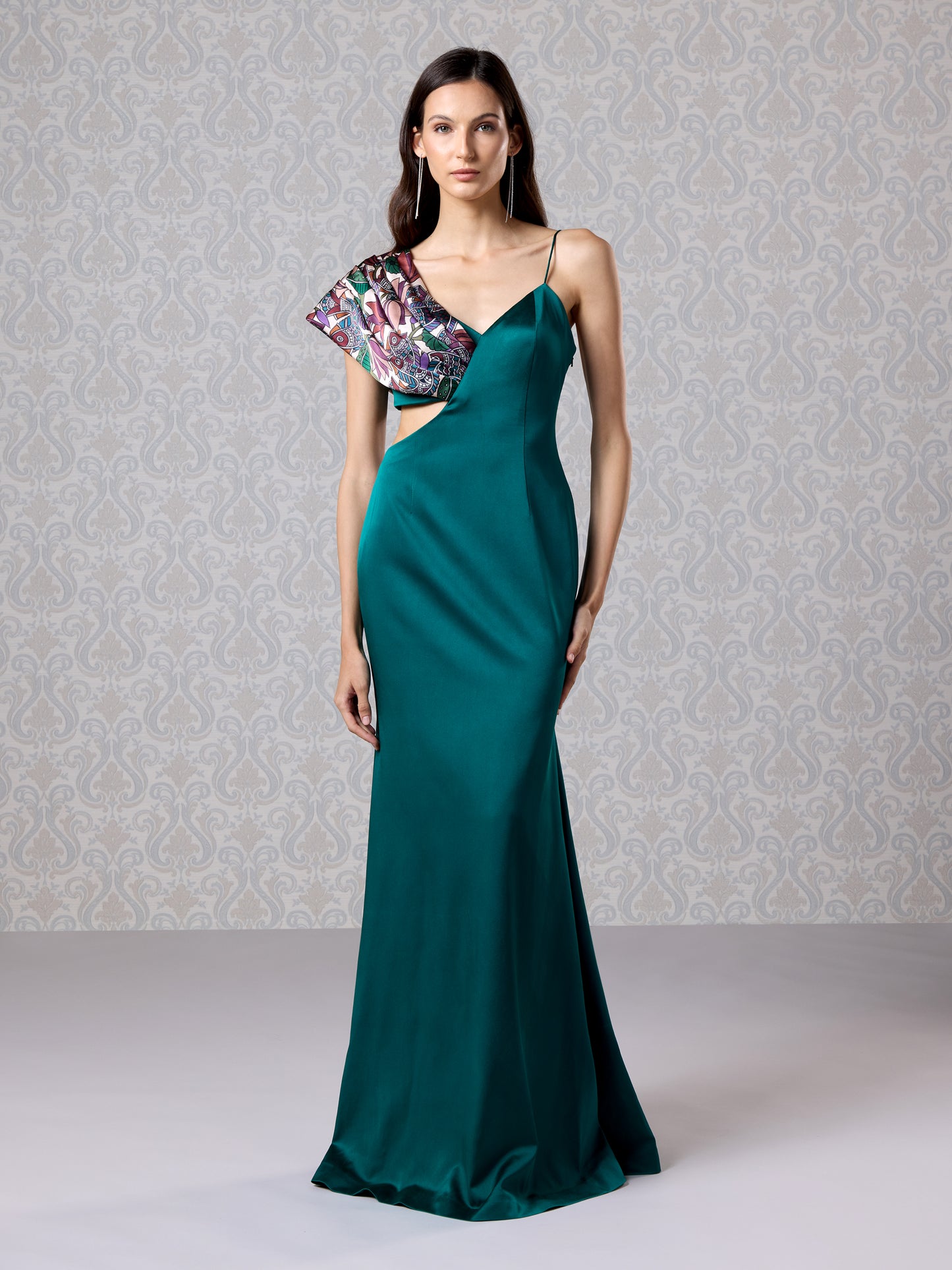Front view of emerald silk satin long dress with printed one-shoulder draped detail