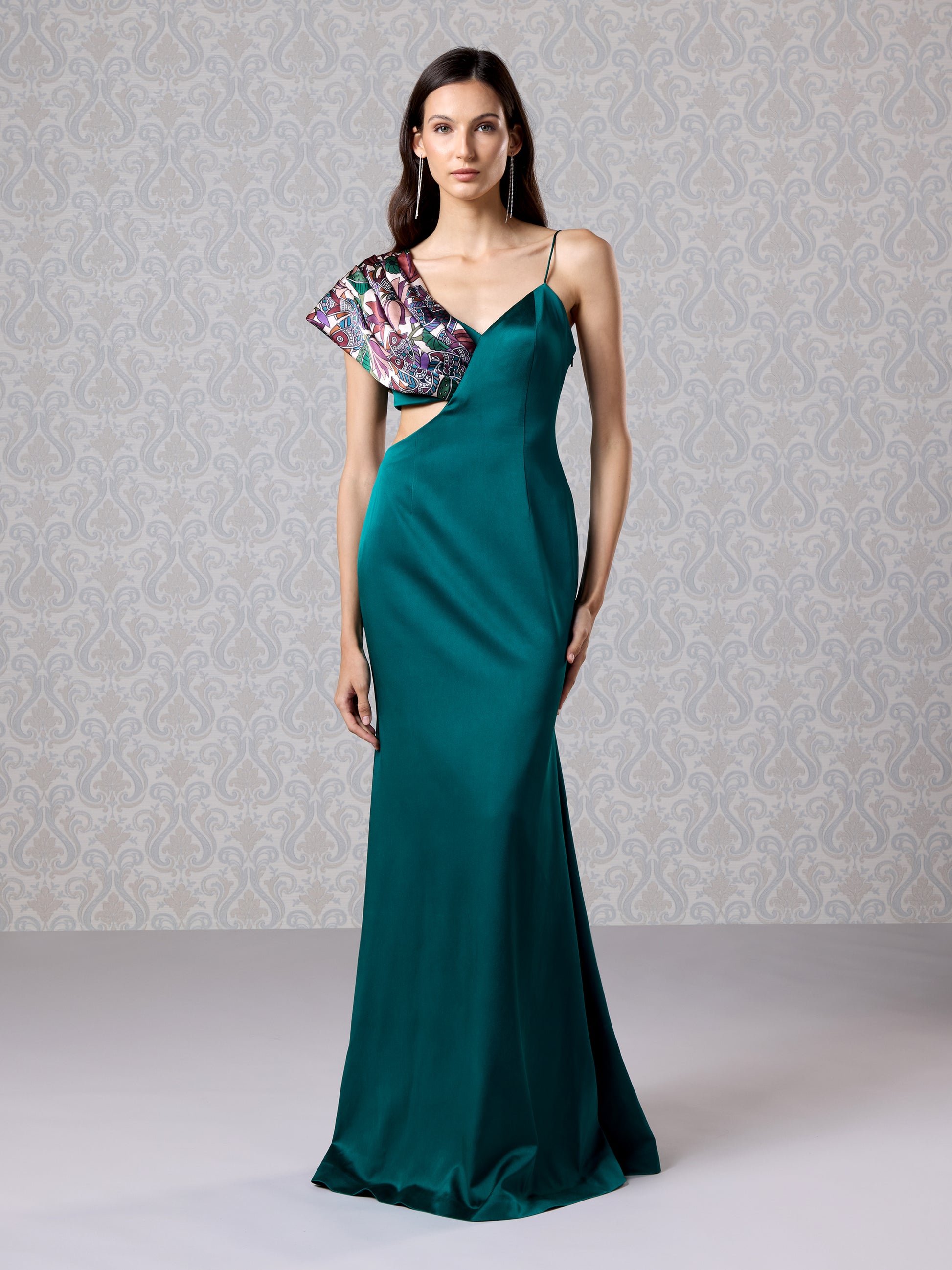 Front view of emerald silk satin long dress with printed one-shoulder draped detail