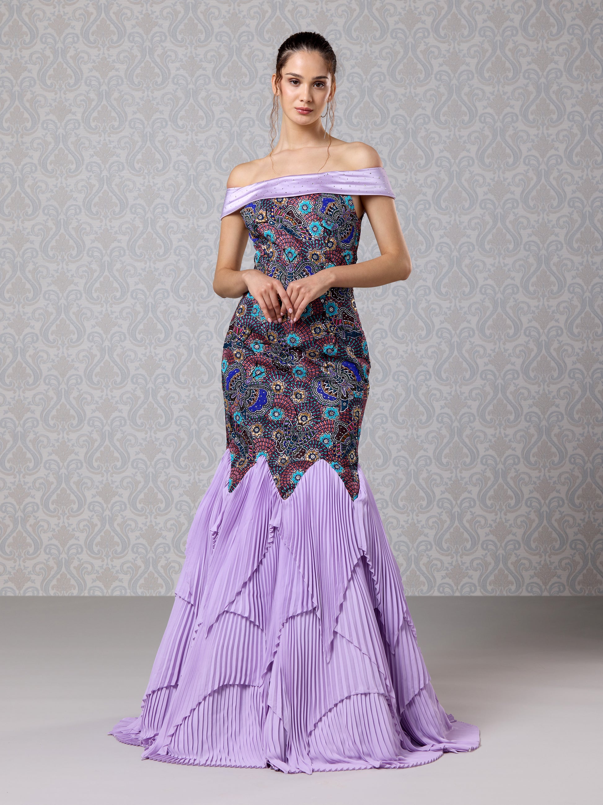 Front view of Amethyst Haze silk satin gown with lilac flared crepe hem and off-shoulder fit