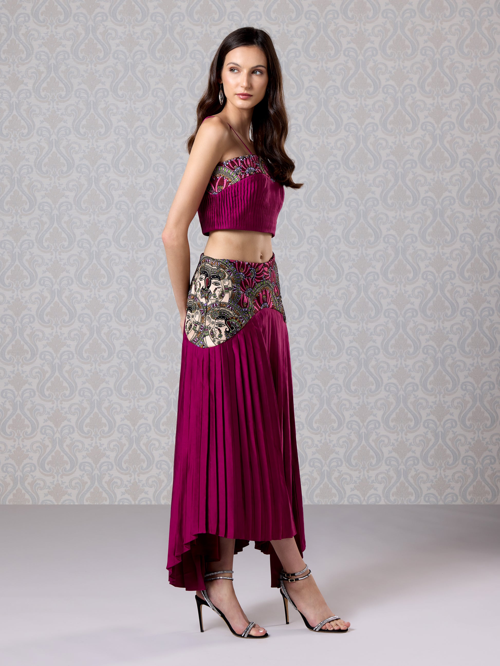 Cranberry silk satin co-ord with pleated skirt and vegan leather waist detailing