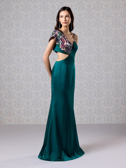 Full-length emerald gown with sculpted drape and elegant side cut-out design