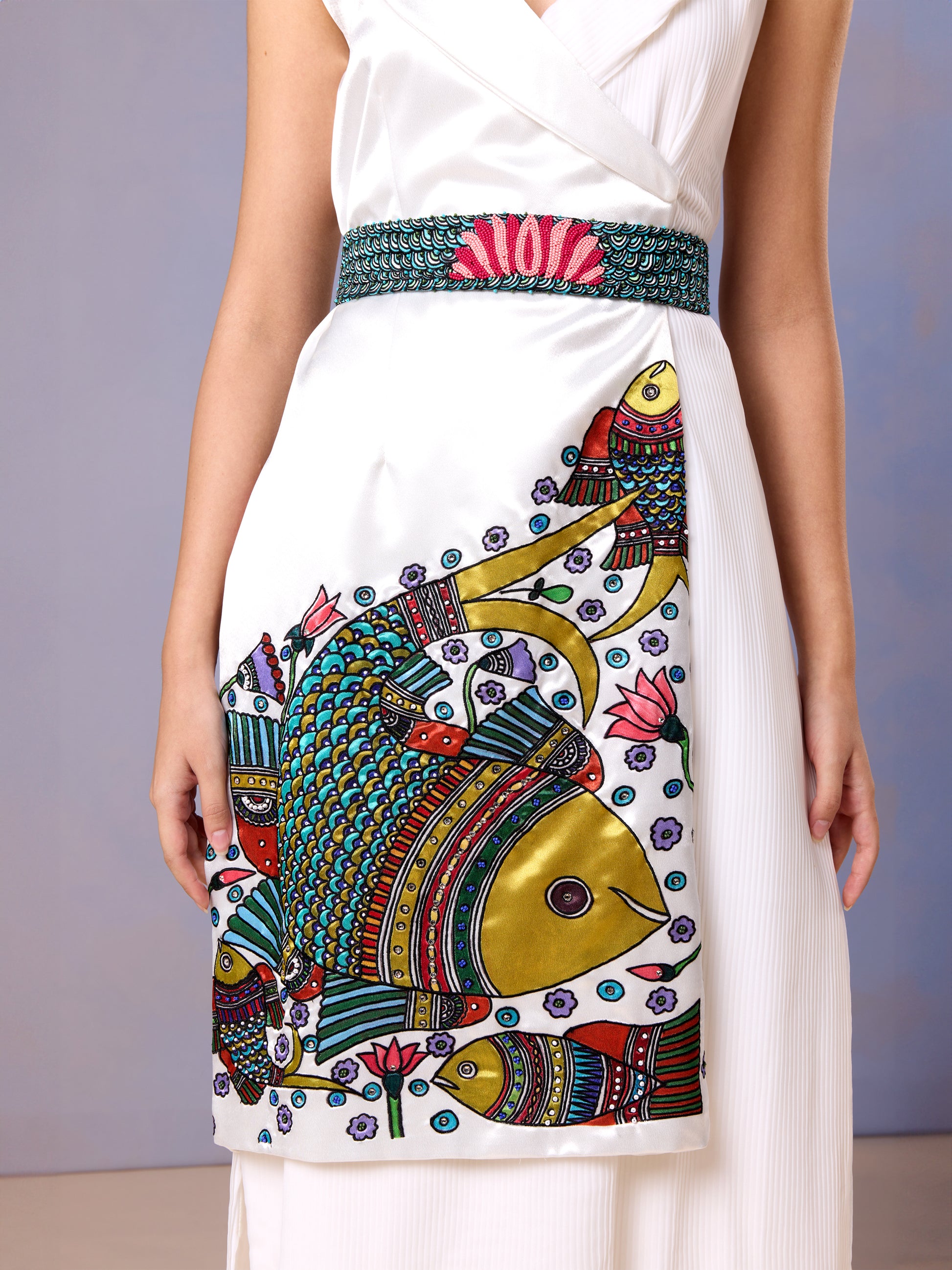 Close-up of hand-embroidered Chantilly white kuti