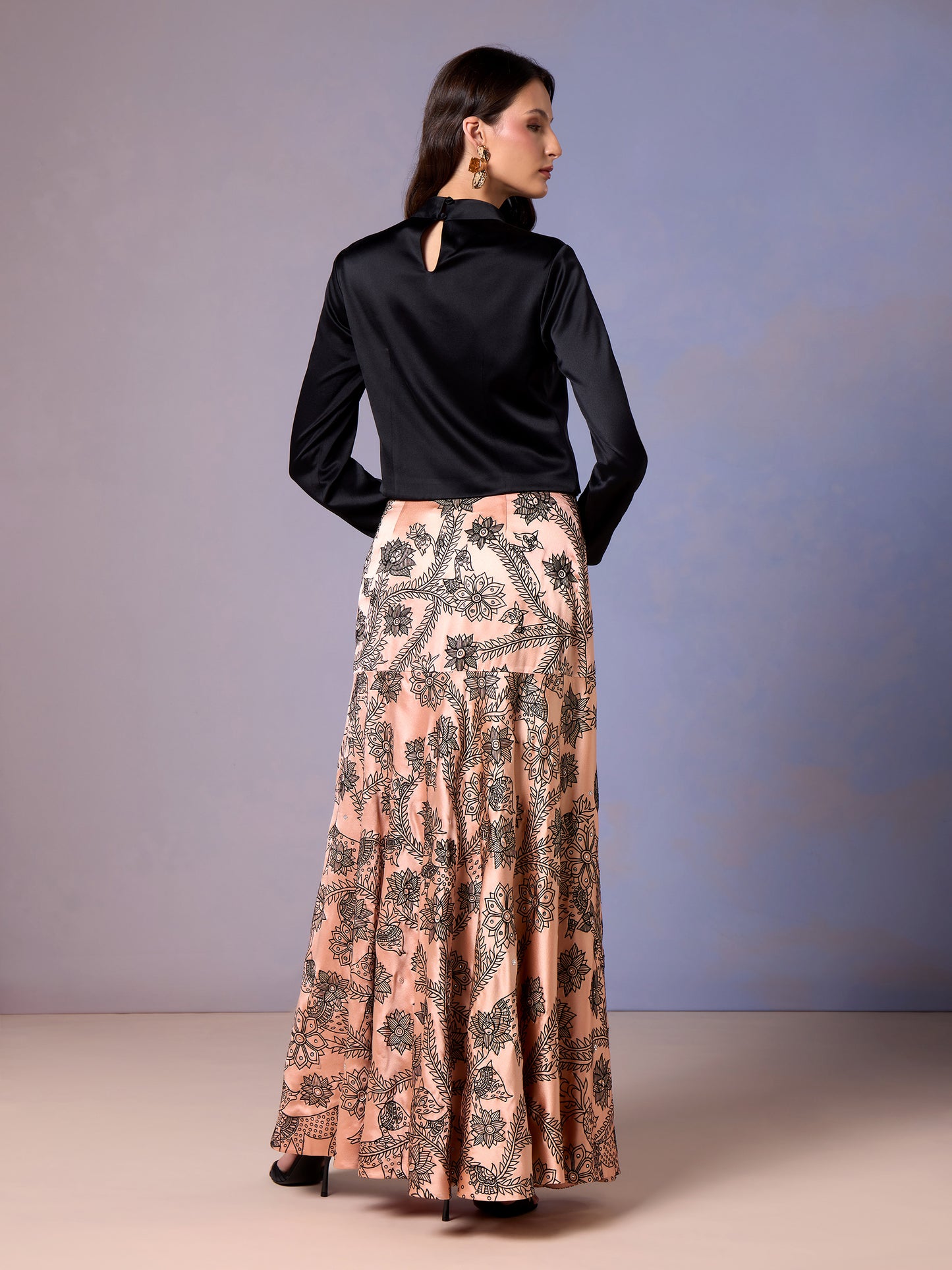 Back view of Coral Blush skirt and black long sleeve top