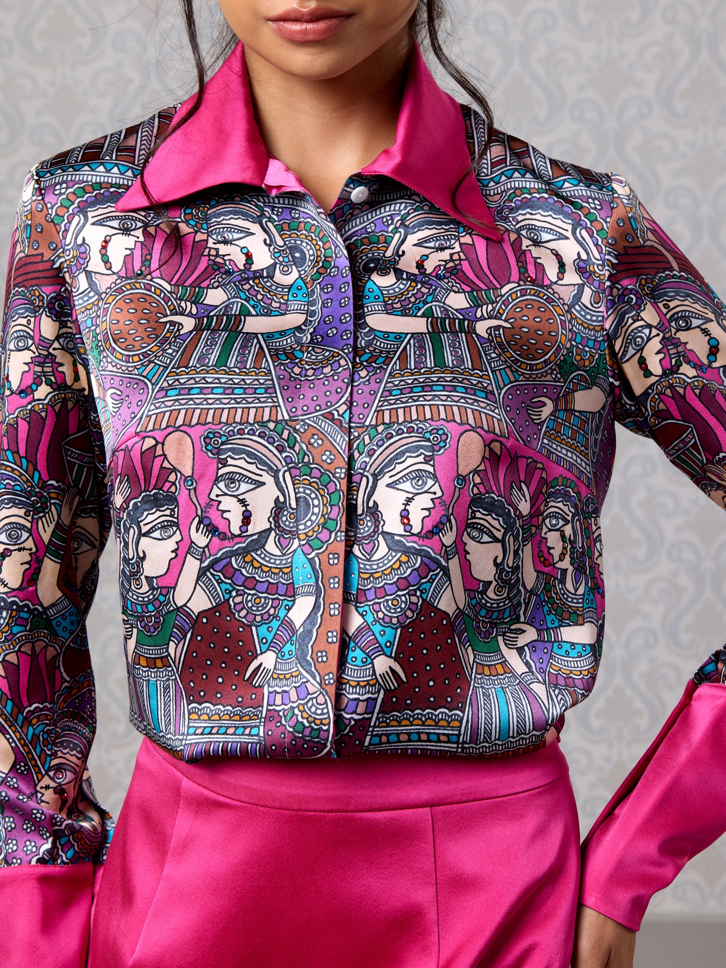 Close-up of merlot silk satin printed shirt with button-down front and collar