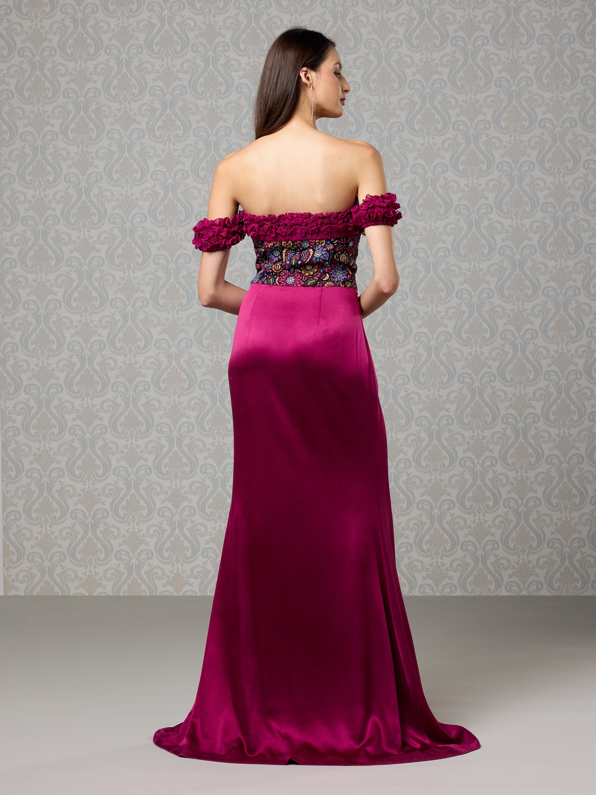 Back view of cranberry satin long gown with off-shoulder floral georgette detailing