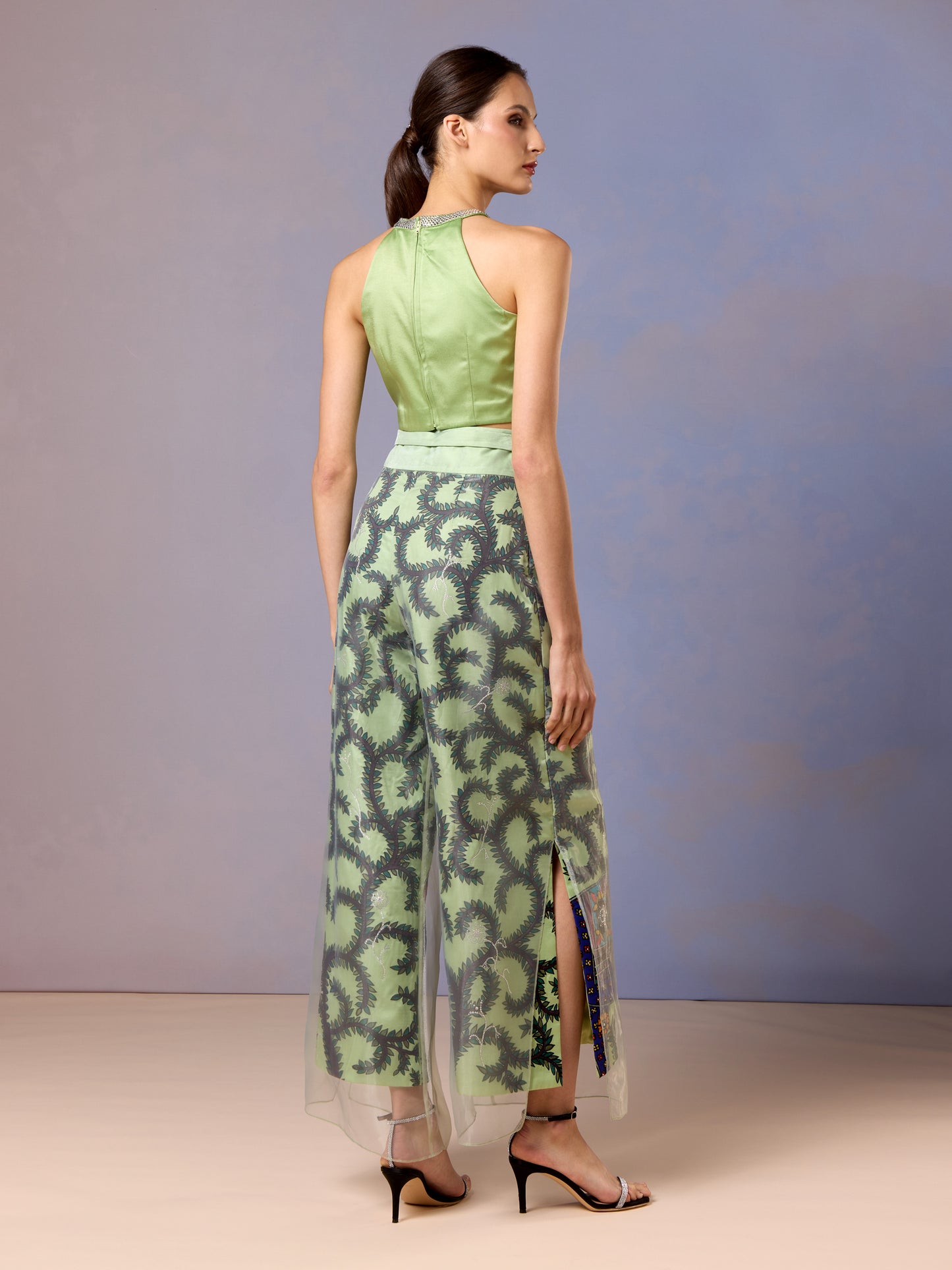 Back view of women in Sage Whisper top and trousers with sheer embroidered detailing