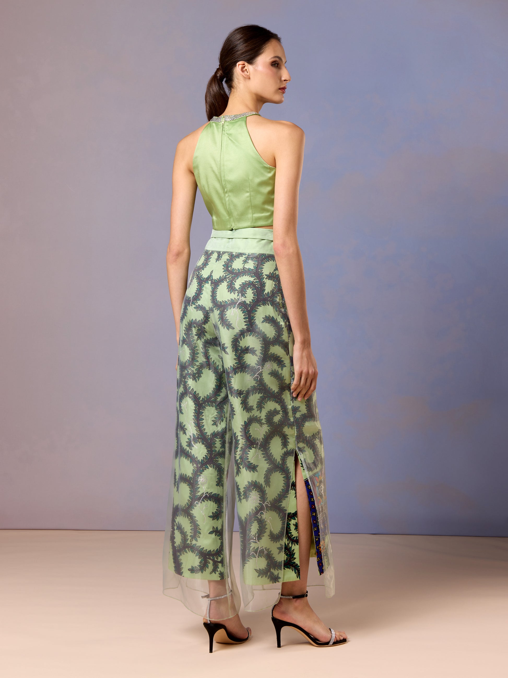 Back view of women in Sage Whisper top and trousers with sheer embroidered detailing
