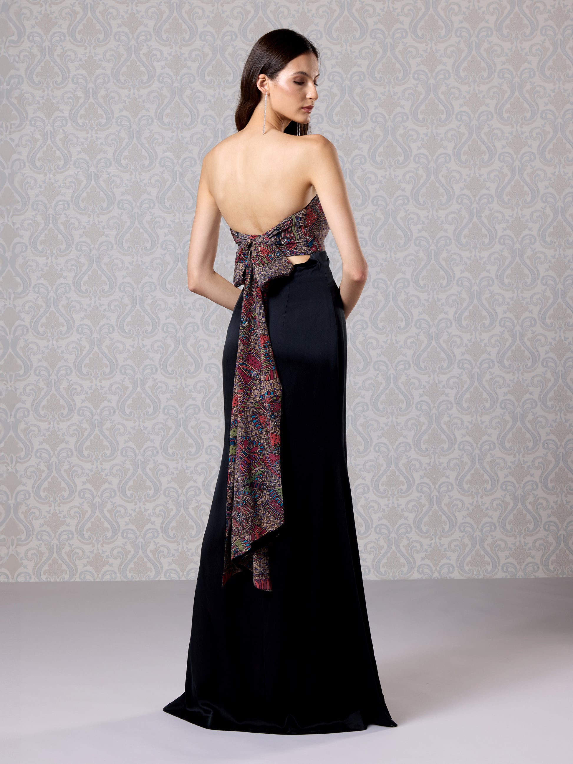 Back side view of strapless multicolor embroidery on Black Ice crepe gown