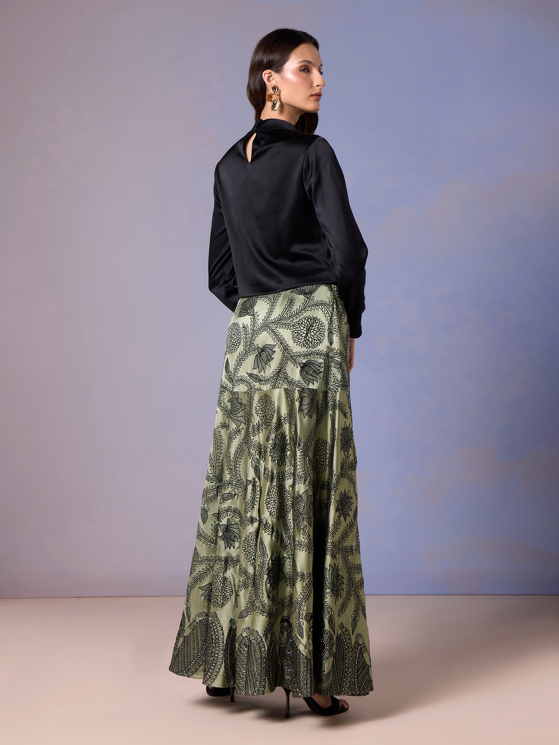 Back view of Sage Whisper long skirt and black draped top