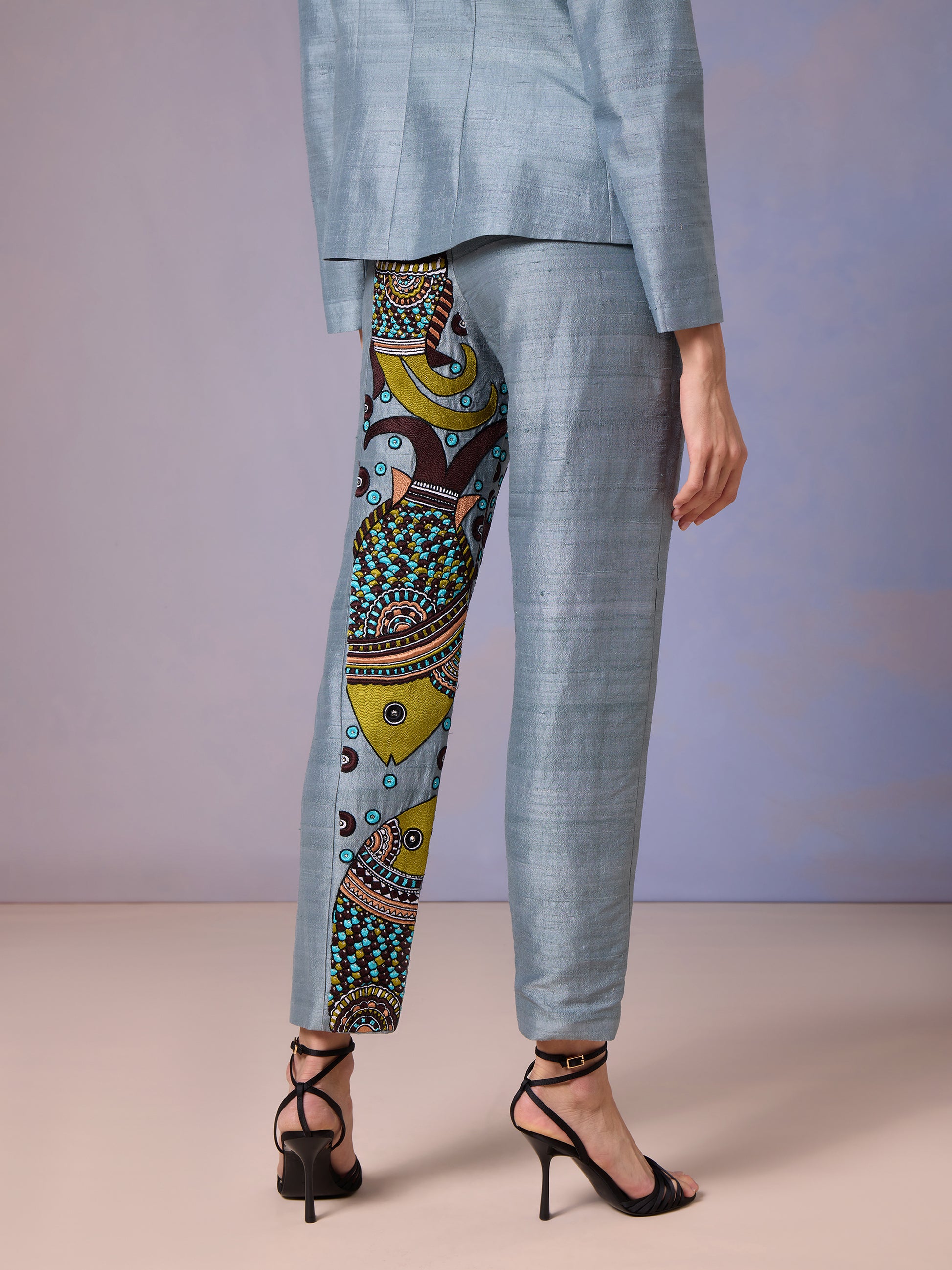 side -view -of -printed -trousers in Glacier -Blue- raw -silk -jacket -set