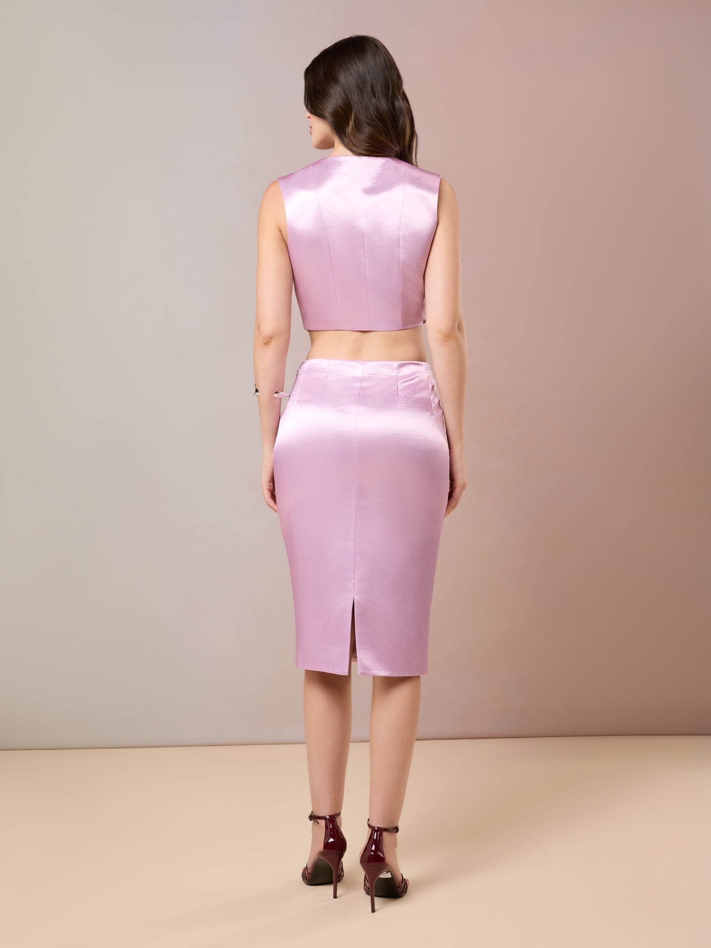 Back view of pink satin top and skirt
