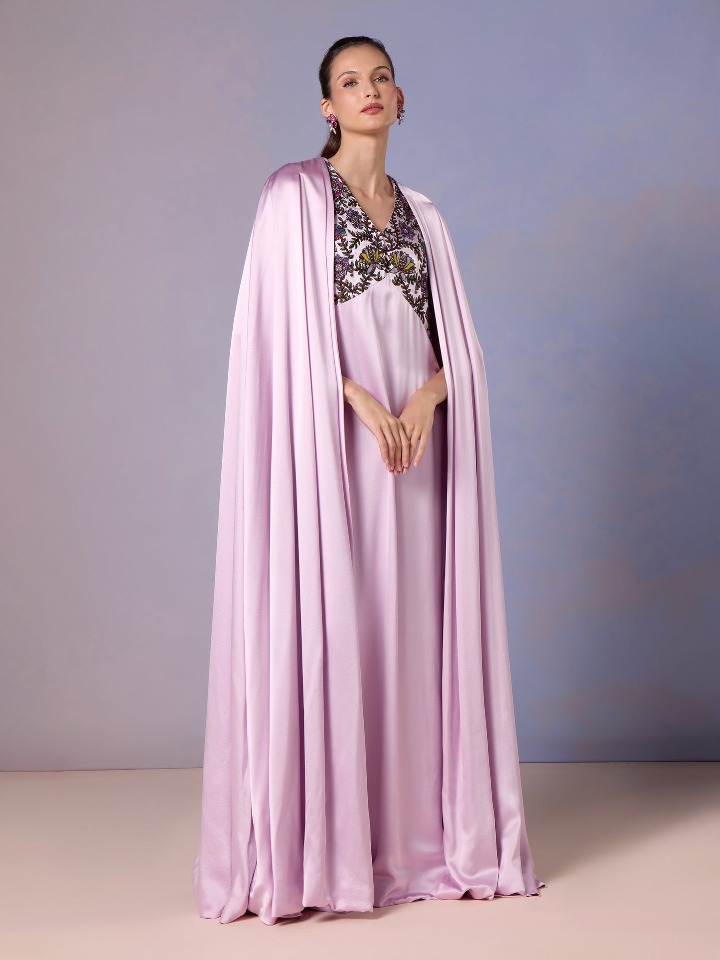 Side view of French Lilac kaftan featuring flowing cape and ornate embroidery