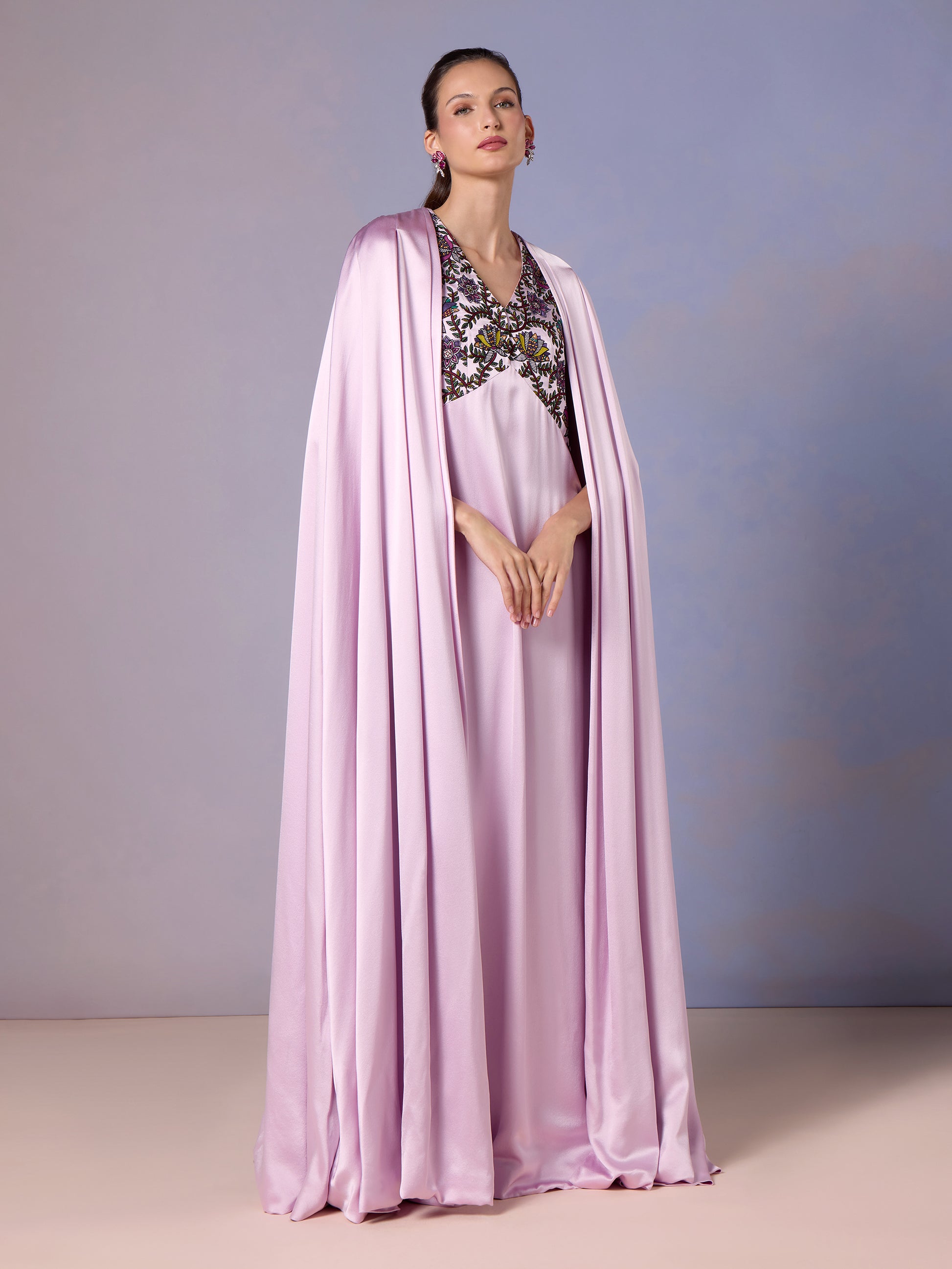 Side view of French Lilac kaftan featuring flowing cape and ornate embroidery