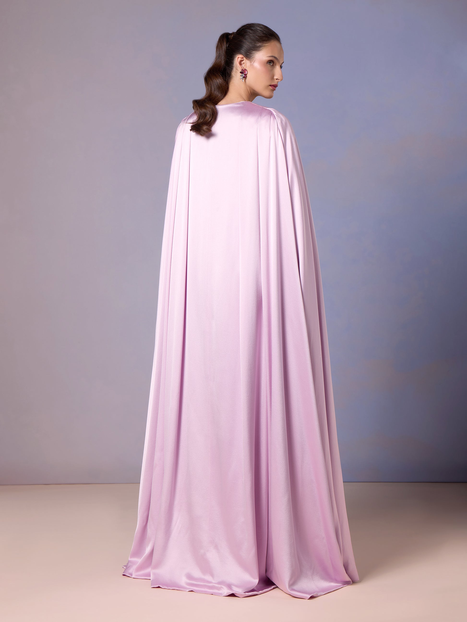 Back of flowing French Lilac silk kaftan with soft cape drape