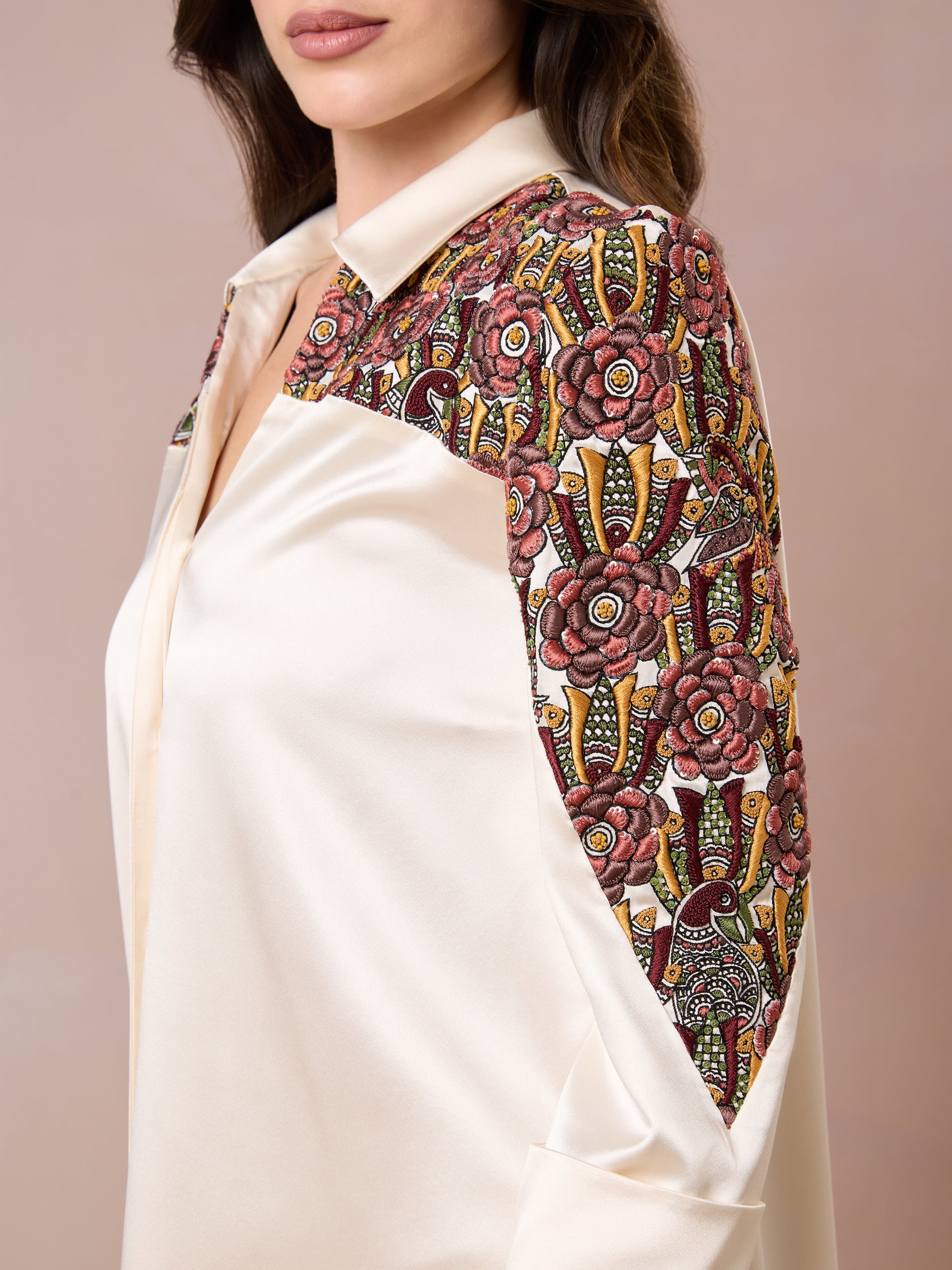 Close-up of embroidered shoulder detail on Champagne Shirt