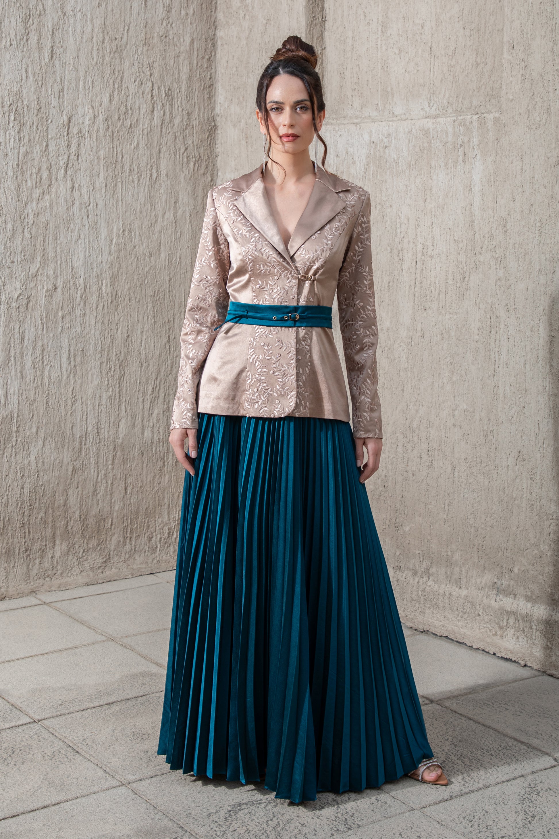 model-in-brown-oak-embroidered top-with-moonlight-blue -pleated skirt