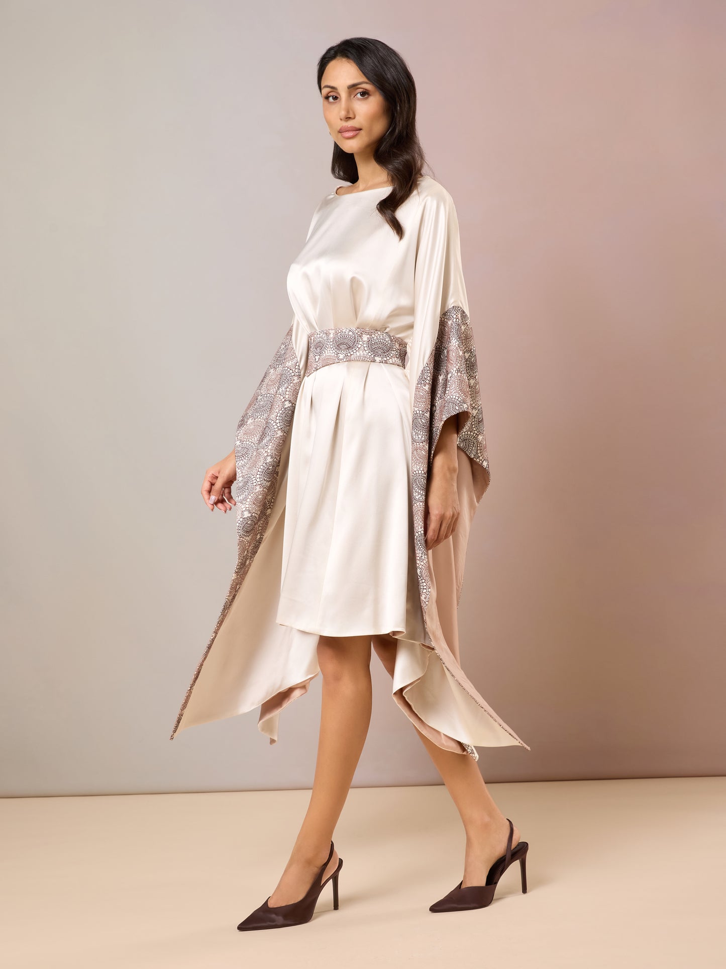Champagne Kaftan dress in side walking pose