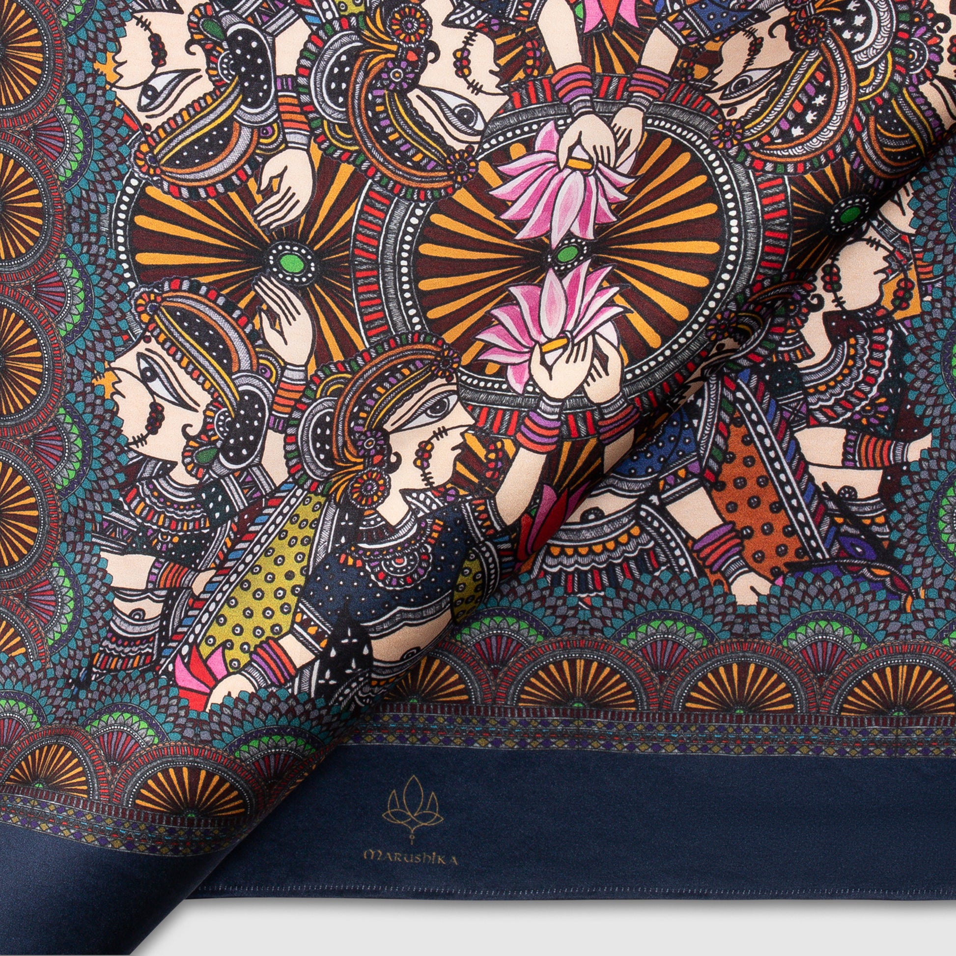 Close-up of navy blue Madhubani scarf with lotus and folk dancer detailing