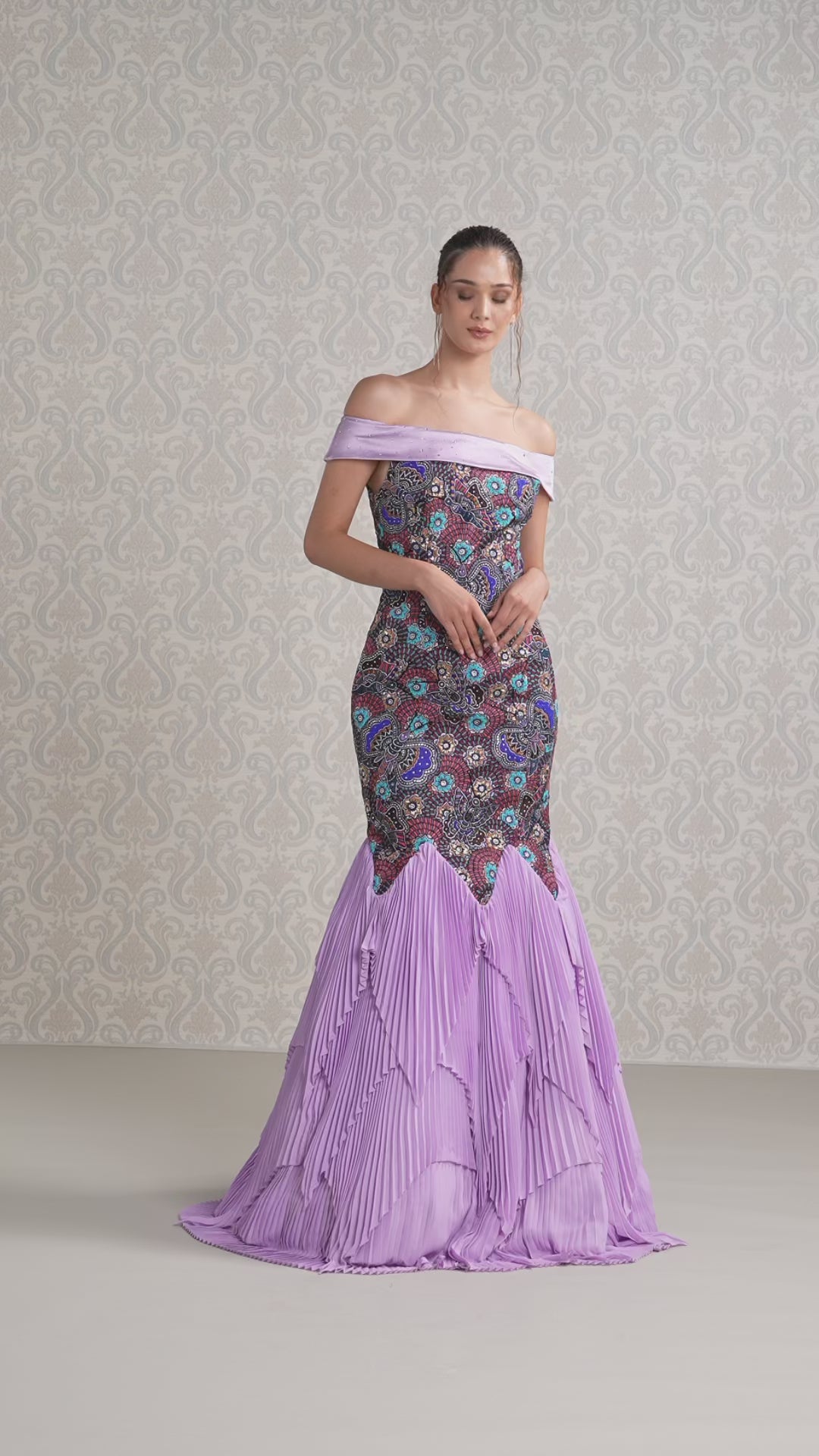 Model showcasing flow and elegance of Amethyst Haze satin crepe gown on the runway