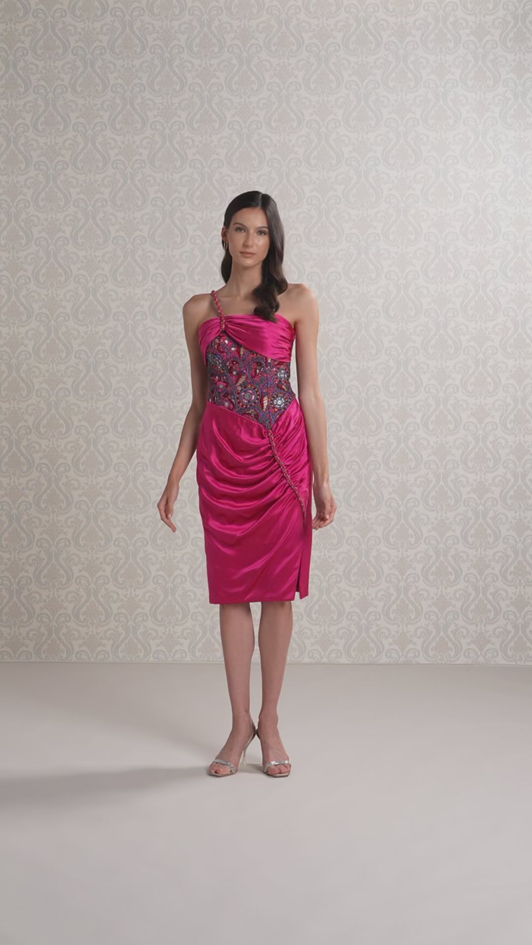 Model showcasing merlot strapless silk satin dress with printed bodice on runway