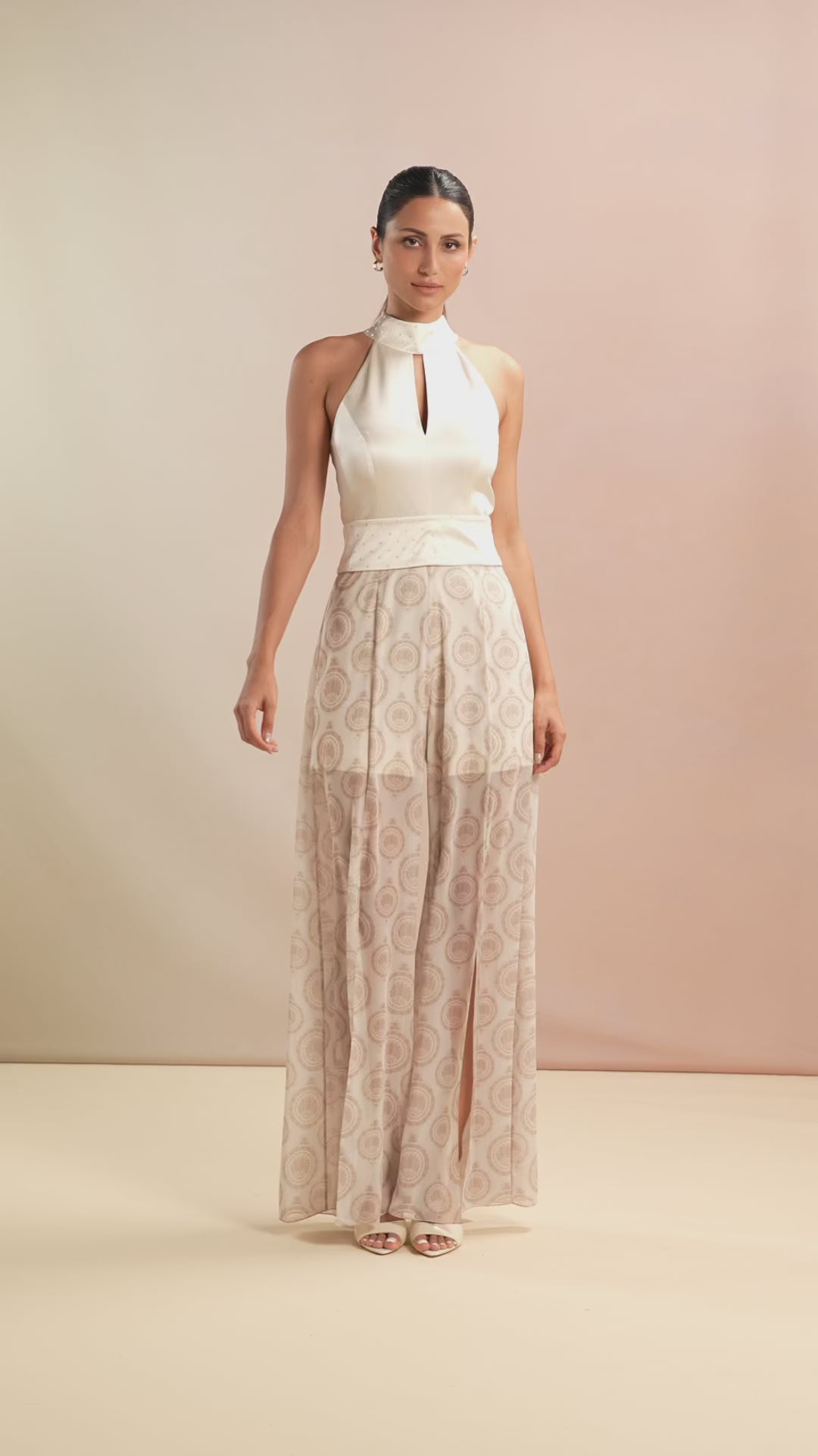 Model walking in Champagne Jumpsuit