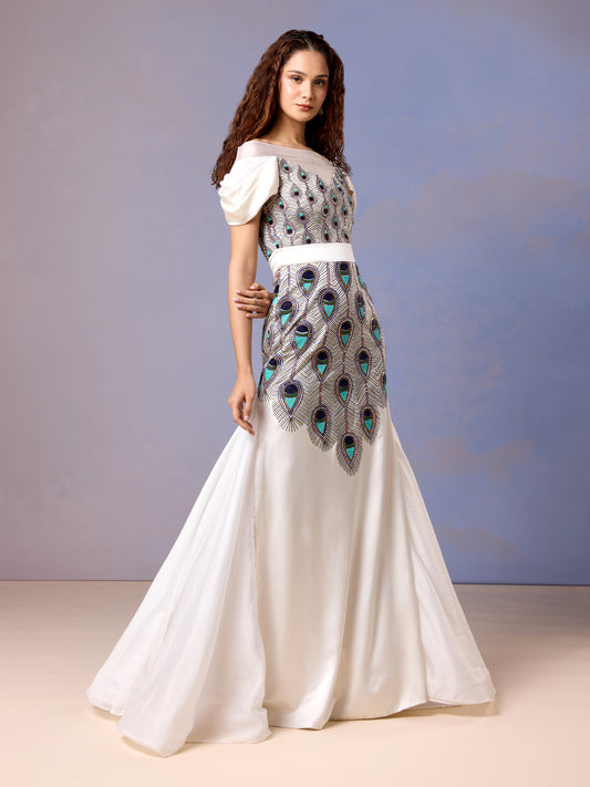 Women wearing Chantilly white silk satin gown with peacock motif front embroidery