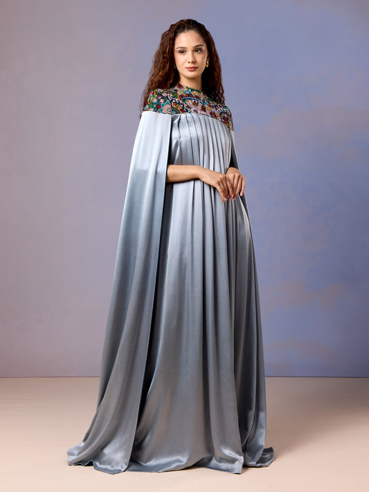 Front view of glacier blue silk kaftan with embroidered neckline