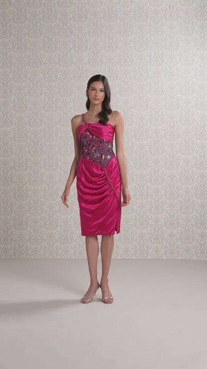 Model showcasing merlot strapless silk satin dress with printed bodice on runway